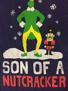 Elf Movie T-Shirt Son Of A Nutcracker Size Medium Blue Christmas T-Shirt - Imagen 1 de 4