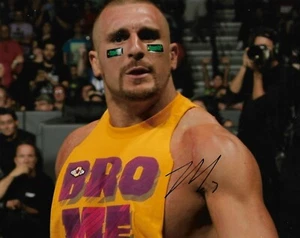 WWE WRESTLING* MOJO RAWLEY SIGNED 10x8 ACTION PHOTO+COA **PROOF** - Picture 1 of 2
