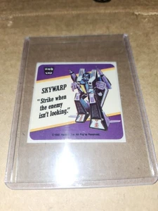 Tarjeta de acción coleccionable pegatina con lema Transformers Skywarp G1 1985 rara de colección - Imagen 1 de 5