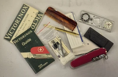 Vintage NEW OLD STOCK PREOWNED VICTORINOX SWISS CHAMP DELUXE SOS KNIFE KIT - Image 1 of 4