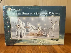 Traditionen Porzellan Weihnachtsmann mit Schlitten und Rentier Weihnachtsdeko Figuren - Bild 1 von 7