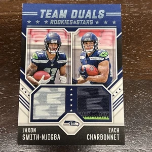 2023 Panini Rookies & Stars - Team Duals Jaxon Smith-Njigba, Zach Charbonnet /49 - Bild 1 von 4