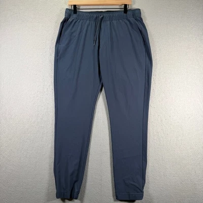 Pantalones de golf Travis Mathew para hombre estilo jogger atlético azul talla 33 cintura ligera Foto 1 de 4