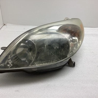 Faro lateral izquierdo del conductor Toyota Matrix, Corolla 2005-2007 OEM 8115002350 Foto 1 de 4