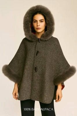 Elegancia versátil: Abrigo reversible de alpaca para bebé para mujer | Capa de lujo Foto 1 de 4