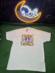NUEVO CON ETIQUETAS Camiseta Blanca Vintage 1996 Juegos Olímpicos de Atlanta Talla XL Estampado Gráfico Hanes - Imagen 1 de 7