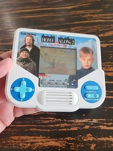 Home Alone 2 Lost in New York Tiger elektronisches Handheld-Videospiel getestet funktioniert - Bild 1 von 9
