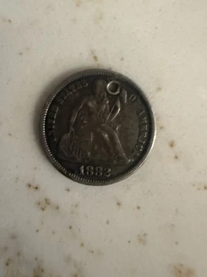 Moneda de diez centavos SEATED LIBERTY 1882 - Ficha de amor Foto 1 de 2