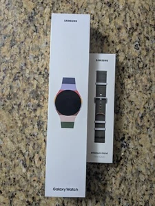 Samsung Galaxy Watch 7 40 mm crème Wi-Fi GPS SM-L300 NEUF avec bracelet vert athlétisme - Photo 1 sur 2