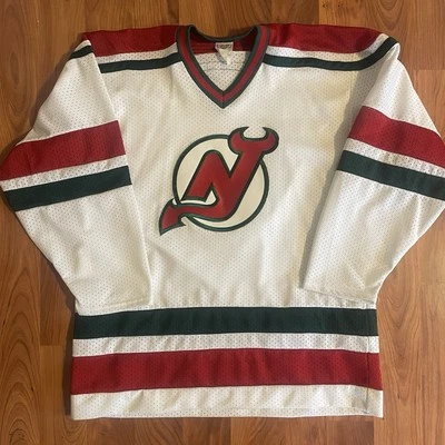 Camiseta deportiva de hockey vintage de malla CCM NJ DEVILS roja blanca y verde - talla L grande Foto 1 de 4