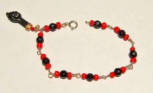 Neu 14kt Gold "AZABACHE" Baby Armband mit hängender Hand - Bild 1 von 2