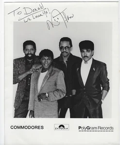 MILAN WILLIAMS SIGNED COMMODORES 8X10 B&W PHOTO VG COND FREE USA SHIPPING - Picture 1 of 1
