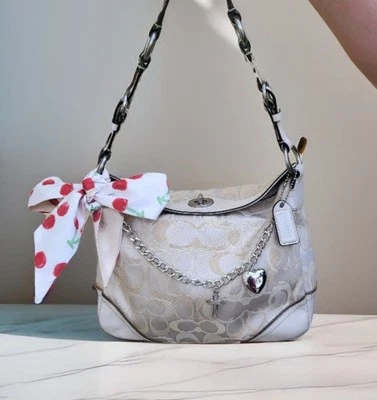 White And Beige Coach Shoulder Bag With Cute Charms And Bow! - Image 1 of 4