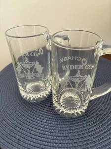 Two 1999 Ryder Cup@“The Country Club” Chase Bank Etched Glass Handled 6” Mug-EUC - Picture 1 of 3