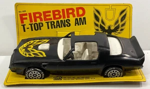 VINTAGE GAY TOYS PONTIAC TRANS AM FIREBIRD ON CARD SMOKEY AND THE BANDIT 1:25 - Picture 1 of 2