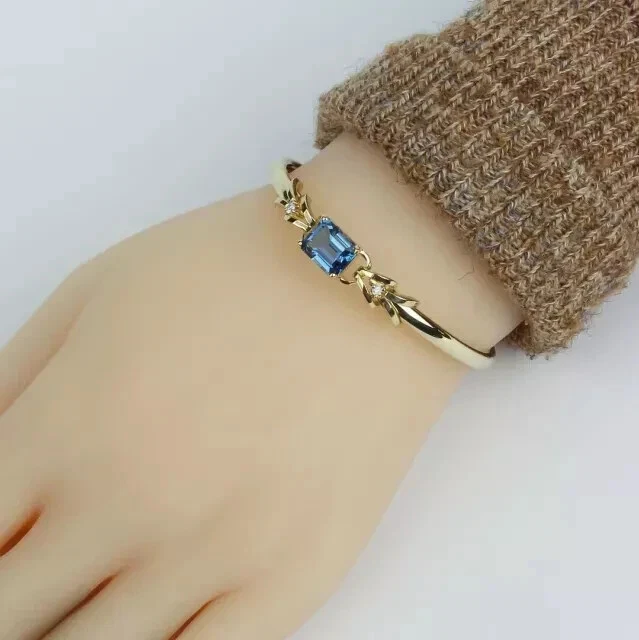 3 Ct Emerald Cut Lab Created Blue Topaz Women Bracelet in 14K Yellow Gold Plated - Image 1 of 4