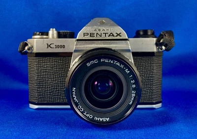 Lente Pentax K1000 con 28 mm f2,8 SMC Pentax-M funciona bien, buen estado, probada con película Foto 1 de 4