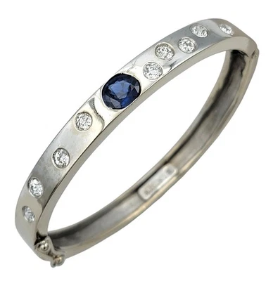 Brazalete con bisagras de diamantes y zafiros azules naturales de Hodson en oro blanco Foto 1 de 4
