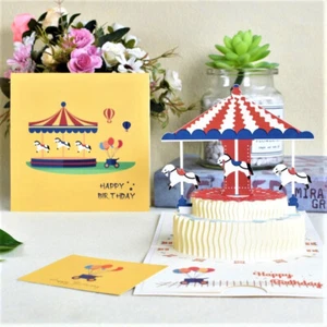 BIGLIETTO AUGURI COMPLEANNO POP UP 3D GIOSTRA - NUOVO - ORIGINALE - Foto 1 di 3