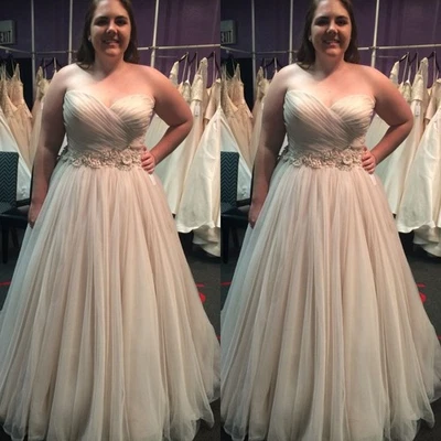 Vestidos de novia sencillos sin mangas blanco marfil línea A vestido de novia talla grande Foto 1 de 4