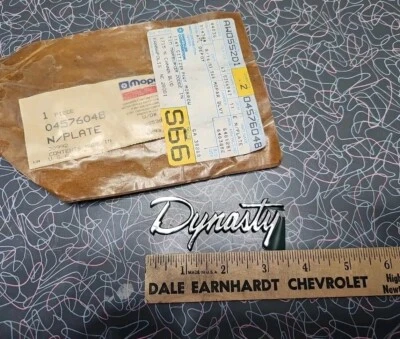 DODGE  DYNASTY EMBLEM ORNAMENT Badge OEM NOS Plastic "DYNASTY" Nameplate New! - Image 1 of 4