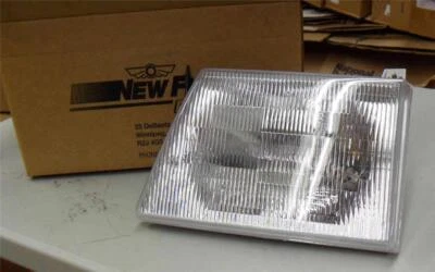 92-96 福特 E150 司机车头灯灯头 LH 125044 >全新< — 第 1/4 张图片