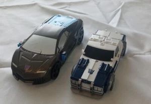 Transformers Age of Extinction Lockdown One-Step Changer Lamborghini & Cop Car - Picture 1 of 6