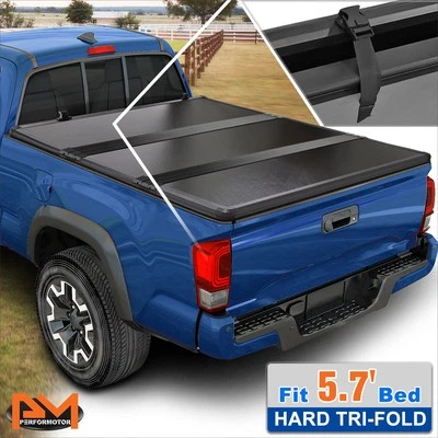 Cubierta rígida sólida triple plegable para camioneta Ram 1500 09-22 con platón corto de 5,7 ft Foto 1 de 4