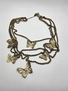 FOSSIL 4 Strand Brass Tone Ball Necklace Dangle Butterfly Charms - Picture 1 of 11