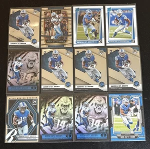 (12) 2021 AMON-RA ST. BROWN ROOKIE LOT MOSAIC OPTIC DONRUSS ILLUSIONS LIONS - Bild 1 von 1