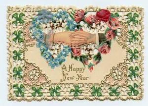 ANTIGUA TARJETA VICTORIANA TROQUELADA *FELIZ AÑO NUEVO * EN RELIEVE * BRILLO * MANOS * TRÉBOLES - Imagen 1 de 1