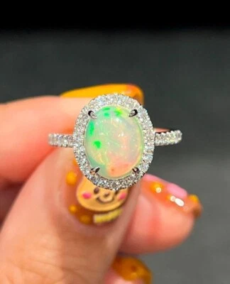 Anillo solitario de ópalo de fuego etíope natural de plata de ley 925 Foto 1 de 4