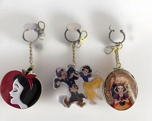 DISNEY PARKS SNOW WHITE 85TH ANNIVERSARY 3-PIECE BAG CHARM/ KEYCHAIN SET - Picture 1 of 1