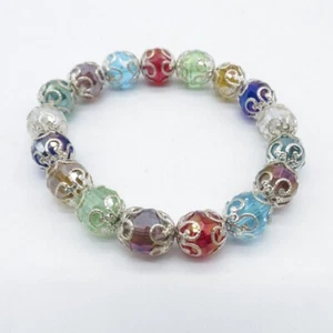 Pulsera elástica multicolor con cuentas ornamentadas tono plata boho uso diario 6,75" - Imagen 1 de 11