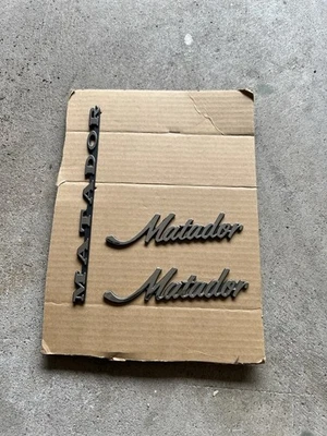 NOS 1971-1973 AMC MATADOR SCRIPTS EMBLEMS - Image 1 of 4