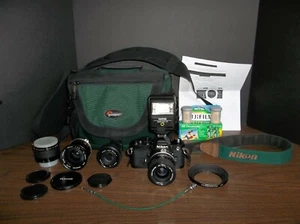 Nikon FM Black 35mm SLR Camera Bundle Mint, lenses, flash, strap, case, film etc - Picture 1 of 12