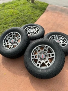 17x8 GUNMETAL TRD WHEELS RIMS AT2 TIRES TOYOTA 4RUNNER TACOMA FJ CRUISER +5MM - Picture 1 of 8