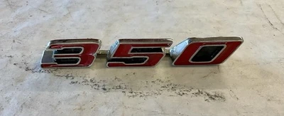 Guardabarros delantero Pontiac Lemans 1968-1972 350 emblema GM NOS C14 Foto 1 de 2