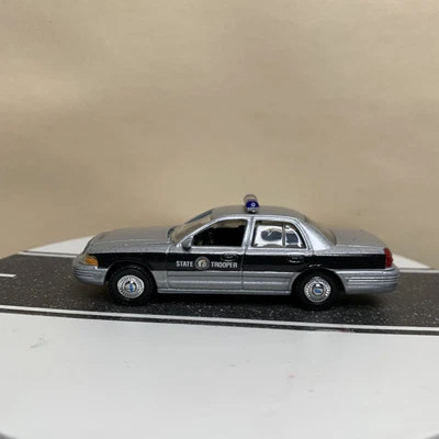 Spec Cast North Carolina State Trooper 2001 Ford Crown Victoria Police Car 1:64  - Image 1 of 4