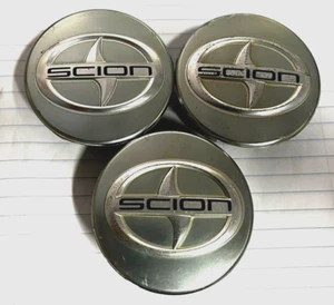2011-2013 Scion TC Aluminum Wheel / Rim 2 7/16" Button Center Caps USED SET/3-B6 - Picture 1 of 2