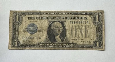 1928 A - $1 SILVER CERTIFICATE  FUNNY BACK WELL - Image 1 of 2