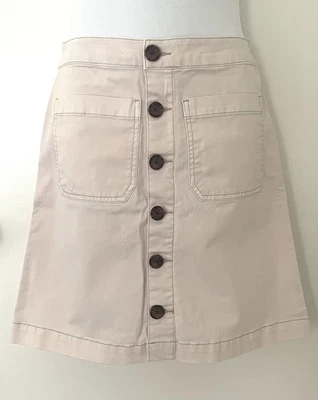 Falda corta rosa abotonada de cintura alta informal de Kensie Jeans para mujer Foto 1 de 4