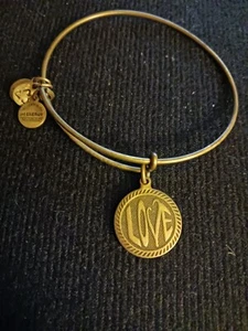 Alex and Ani Brass color bracelet wiht LOVE charm Retired charm, Friendship - Picture 1 of 2