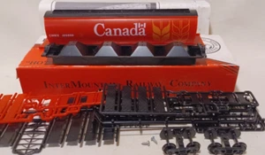 HO SCALE INTERMOUNTAIN Canada Grain Cylindrical 4-bay grain hopper #109899 NIB - Picture 1 of 5