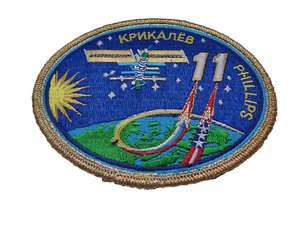 Aufnäher NASA der ISS Expedition -11   ca 12 cm mit Missionsheft - Picture 1 of 2