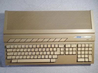 Atari 1040 STE Vintage Computer + Manual. Has Power & Loads Discs - image 1 of 4