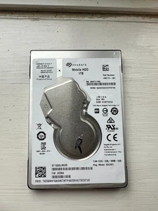 Seagate 1TB 2.5 HDD SATA Slim 7mm ST1000LM035 Hard Disk Drive Laptop - Picture 1 of 3
