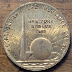 Ficha giratoria de exhibición de seguros de vida metropolitanos de la Feria Mundial de Nueva York 1939 - Imagen 1 de 4