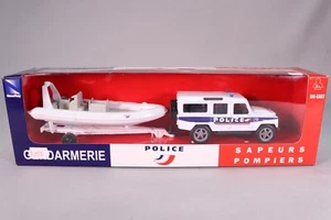 LE5924 NEW RAY 19915 Land Rover police avec remorque zodiac - Foto 1 di 5
