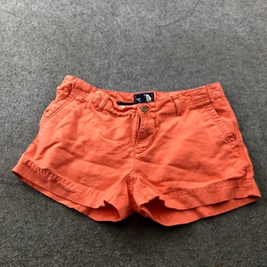 The North Face Shorts Womens Large Orange Pockets Casual Hiking Outdoors - Picture 1 of 13